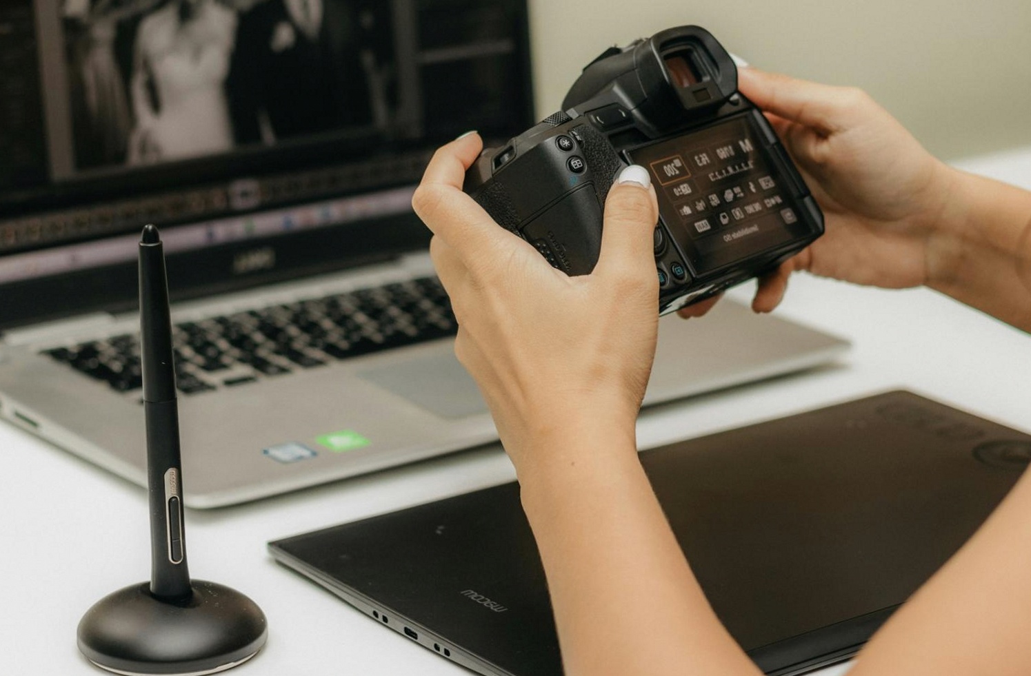Photographer reviewing composition techniques during a practical masterclass session